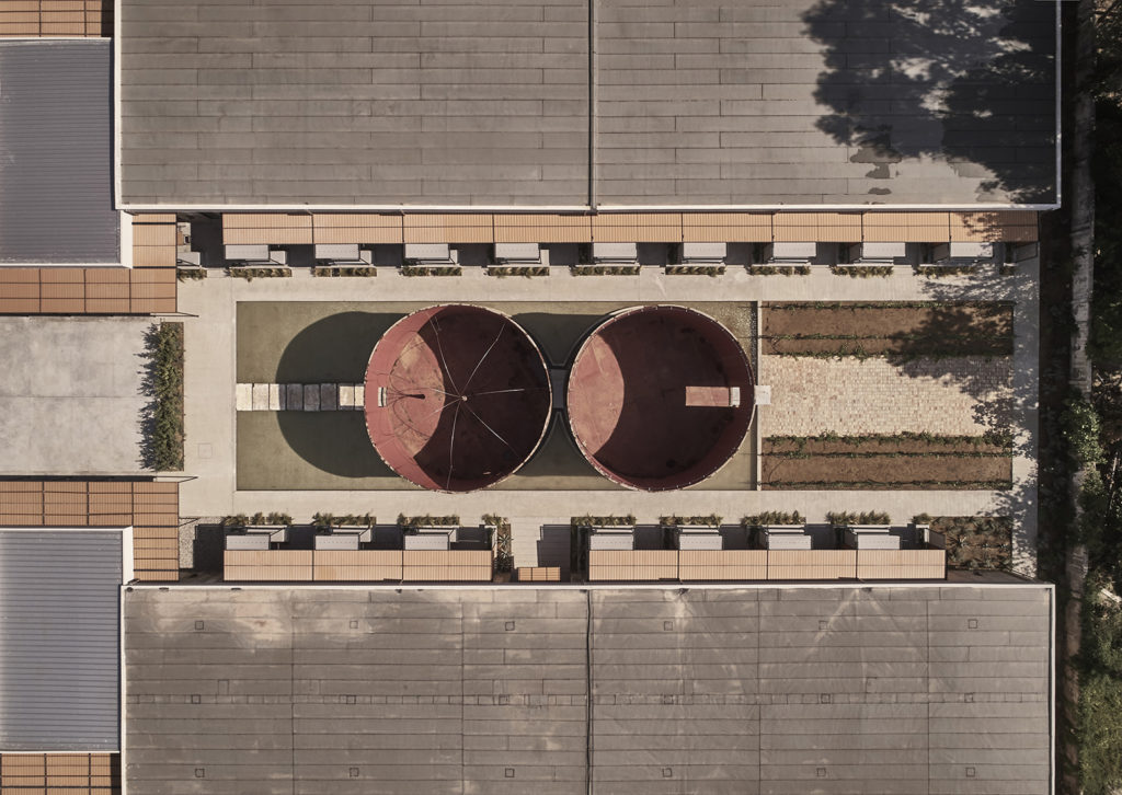 dexamenes°° courtyard, our 2 signature silo tanks